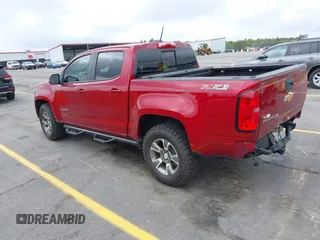 2020 Chevrolet Colorado 4WD Z71 with VIN 1GCGTDEN3L1132444, listed as a IAAI auction lot 41898911 with 65,493 mi miles and . Bid and sale history available at DreamBid. Image 3.