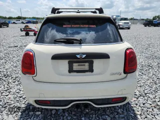 2015 MINI Hardtop 4 Door S z VIN WMWXU3C50F2B56953, wystawiony jako Copart lot #58579615 z przebiegiem Nie podano mil oraz Szkoda całkowita • Salvage title. Historia ofert i sprzedaży dostępna na DreamBid. Obrazek 6.
