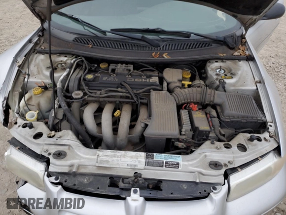 2000 Dodge Stratus z VIN 1B3EJ46X2YN119487, wystawiony jako Copart lot #86391734 z przebiegiem 55 277 mil mil oraz Szkoda całkowita • Salvage title. Historia ofert i sprzedaży dostępna na DreamBid. Obrazek 11.