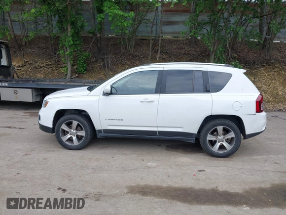 2016 Jeep Compass High Altitude with VIN 1C4NJDEB0GD546305, listed as a IAAI auction lot 42371770 with 158,486 mi miles and . Bid and sale history available at DreamBid. Image 14.