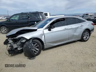 2020 Toyota Avalon Hybrid XLE z VIN 4T1A21FB9LU012511, wystawiony jako Copart lot #74791854 z przebiegiem 38 764 mil mil oraz Szkoda całkowita • Salvage title. Historia ofert i sprzedaży dostępna na DreamBid. Obrazek 1.