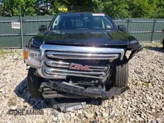 2015 GMC Canyon 4WD SLE with VIN 1GTG6BE34F1252557, listed as a Copart auction lot 61313294 with 16,084 mi miles and Salvage Title. Bid and sale history available at carsss.com. Image 5.