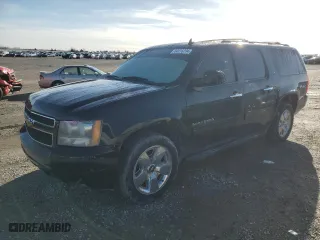 2009 Chevrolet Suburban LT w/2LT with VIN 1GNFC26069R297182, listed as a Copart auction lot 84915294 with 221,946 mi miles and Salvage Title. Bid and sale history available at carsss.com. Image 1.