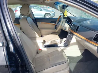 2012 Lincoln MKZ with VIN 3LNHL2JC5CR829225, listed as a IAAI auction lot 42088988 with 121,136 mi miles. Bid and sale history available at carsss.com. Image 5.