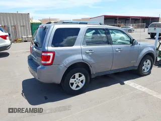 2008 Ford Escape Hybrid z VIN 1FMCU49HX8KC68082, wystawiony jako IAAI lot #42806471 z przebiegiem 104 848 mil mil oraz . Historia ofert i sprzedaży dostępna na DreamBid. Obrazek 4.