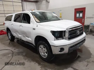 2013 Toyota Tundra z VIN 5TFDY5F13DX313385, wystawiony jako IAAI lot #42200622 z przebiegiem 161 470 mil mil oraz . Historia ofert i sprzedaży dostępna na DreamBid. Obrazek 1.
