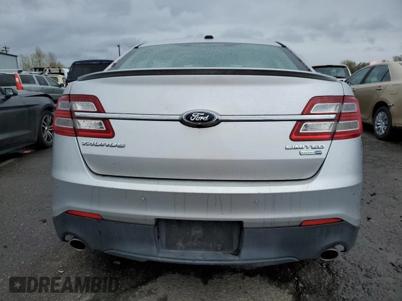 2013 Ford Taurus Limited z VIN 1FAHP2J89DG141683, wystawiony jako Copart lot #52462575 z przebiegiem 77 235 mil mil oraz Czysty tytuł • Clean title. Historia ofert i sprzedaży dostępna na DreamBid. Obrazek 6.