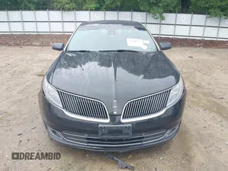 2014 Lincoln MKS z VIN 1LNHL9DK0EG610145, wystawiony jako IAAI lot #42348345 z przebiegiem 61 289 mil mil oraz . Historia ofert i sprzedaży dostępna na DreamBid. Obrazek 13.
