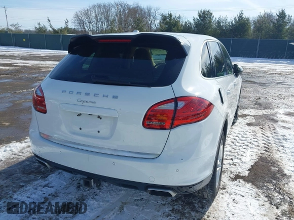 2014 Porsche Cayenne with VIN WP1AA2A2XELA95734, listed as a IAAI auction lot 41583908 with 95,751 mi miles and . Bid and sale history available at DreamBid. Image 4.