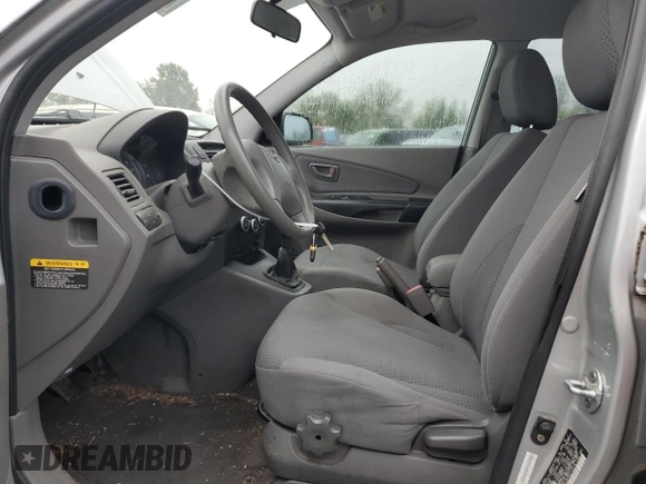 2009 Hyundai Tucson GLS with VIN KM8JM12B79U113216, listed as a Copart auction lot 75191434 with 132,677 mi miles and Salvage Title. Bid and sale history available at carsss.com. Image 7.