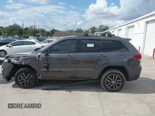 2018 Jeep Grand Cherokee Trailhawk with VIN 1C4RJFLG8JC427345, listed as a IAAI auction lot 41557222 with 49,469 mi miles and . Bid and sale history available at DreamBid. Image 14.