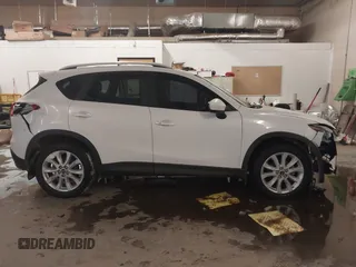2013 Mazda CX-5 Grand Touring with VIN JM3KE4DE8D0147851, listed as a IAAI auction lot 41570695 with 94,648 mi miles. Bid and sale history available at carsss.com. Image 13.