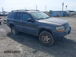 2004 Jeep Grand Cherokee Laredo with VIN 1J4GW48S74C350718, listed as a IAAI auction lot 41947711 with 189,299 mi miles. Bid and sale history available at carsss.com. Image 1.