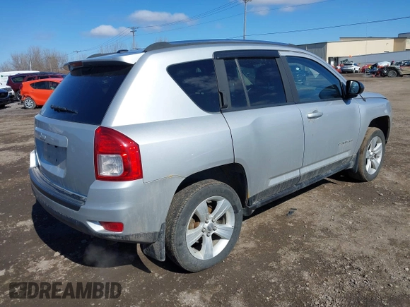 2012 Jeep Compass Sport with VIN 1C4NJDBB0CD590268, listed as a IAAI auction lot 41856474 with 148,627 mi miles. Bid and sale history available at carsss.com. Image 4.
