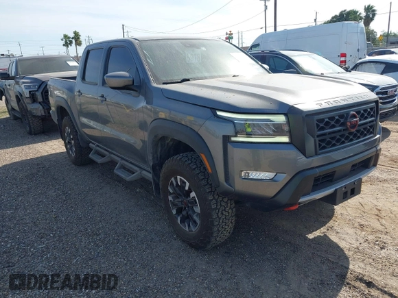 2023 Nissan Frontier Pro-4X z VIN 1N6ED1EK0PN670619, wystawiony jako IAAI lot #42044366 z przebiegiem 26 475 mil mil oraz . Historia ofert i sprzedaży dostępna na DreamBid. Obrazek 1.