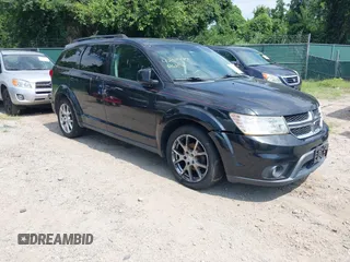 2012 Dodge Journey SXT with VIN 3C4PDDBG3CT144881, listed as a IAAI auction lot 42844117 with 184,804 mi miles and . Bid and sale history available at DreamBid. Image 1.