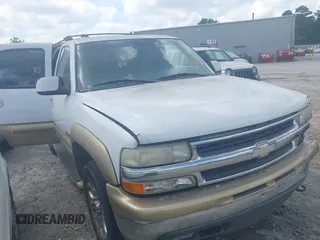 2001 Chevrolet Tahoe LS z VIN 1GNEC13T11R162930, wystawiony jako IAAI lot #42373226 z przebiegiem 335 448 mil mil oraz . Historia ofert i sprzedaży dostępna na DreamBid. Obrazek 1.