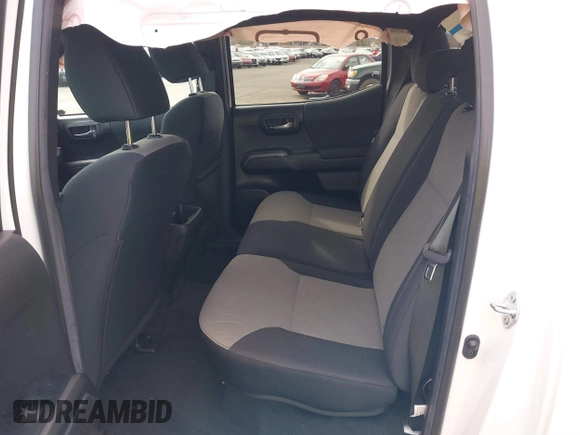 2023 Toyota Tacoma SR z VIN 3TMCZ5AN0PM541700, wystawiony jako IAAI lot #41819408 z przebiegiem 14 216 mil mil oraz . Historia ofert i sprzedaży dostępna na DreamBid. Obrazek 8.
