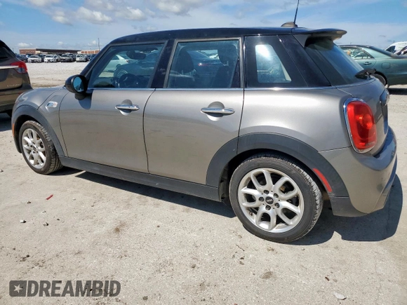 2018 MINI Hardtop 4 Door Cooper S with VIN WMWXU3C50J2F50669, listed as a Copart auction lot 55924355 with 64,702 mi miles and Salvage title. Bid and sale history available at DreamBid. Image 2.