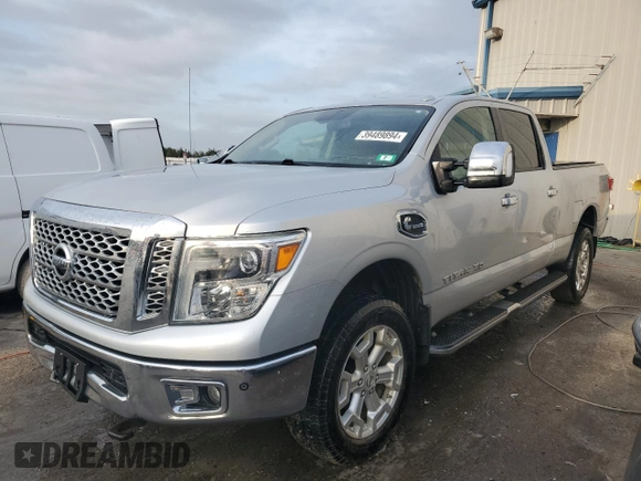 2016 Nissan Titan XD Platinum Reserve with VIN 1N6BA1F46GN513608, listed as a Copart auction lot 39489894 with 158,300 mi miles and Salvage Title. Bid and sale history available at carsss.com. Image 1.