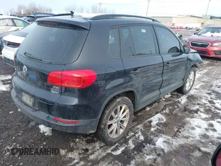 2017 Volkswagen Tiguan S with VIN WVGBV7AX7HK047973, listed as a IAAI auction lot 41197329 with 92,960 mi miles and . Bid and sale history available at DreamBid. Image 4.