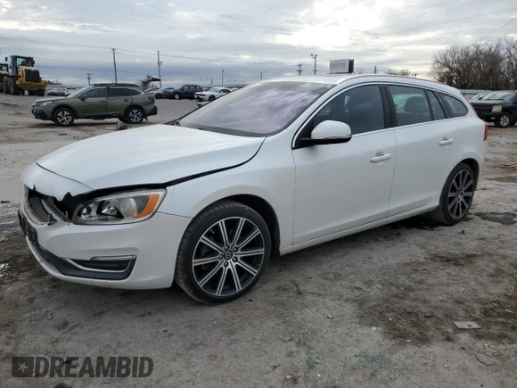 2015 Volvo V60 T5 Drive-E Premier with VIN YV140MEK2F1233829, listed as a Copart auction lot 83320544 with 143,632 mi miles and Salvage Title. Bid and sale history available at carsss.com. Image 1.