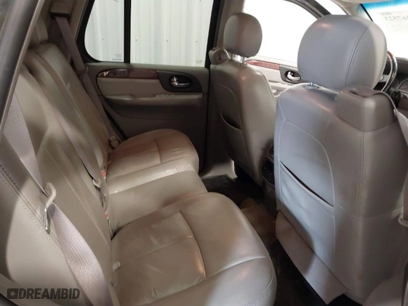 2006 GMC Envoy Denali with VIN 1GKET63M662310282, listed as a IAAI auction lot 41367523 with 216,451 mi miles. Bid and sale history available at carsss.com. Image 8.