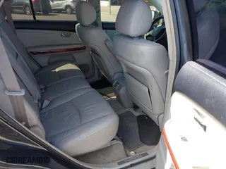2004 Lexus RX 330 with VIN JTJGA31UX40001738, listed as a IAAI auction lot 41762207 with 202,440 mi miles. Bid and sale history available at carsss.com. Image 8.