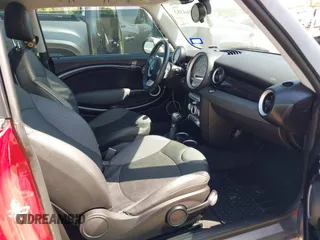2009 MINI Hardtop S with VIN WMWMF73569TW86229, listed as a IAAI auction lot 42264383 with 63,482 mi miles and . Bid and sale history available at DreamBid. Image 5.