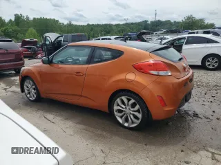 2013 Hyundai Veloster w/Black Int with VIN KMHTC6ADXDU121105, listed as a Copart auction lot 55171015 with 130,905 mi miles and Salvage title. Bid and sale history available at DreamBid. Image 2.