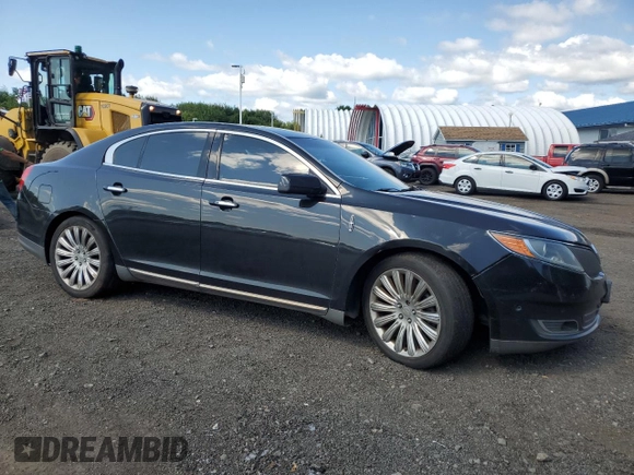 2013 Lincoln MKS z VIN 1LNHL9EK2DG615733, wystawiony jako Copart lot #68223794 z przebiegiem 402 495 mil mil oraz Szkoda całkowita • Salvage title. Historia ofert i sprzedaży dostępna na DreamBid. Obrazek 4.