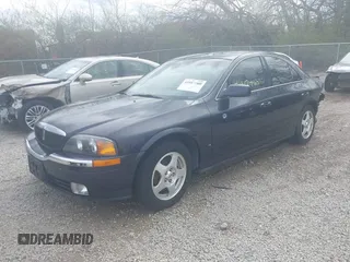 2000 Lincoln LS with VIN 1LNHM87A6YY879355, listed as a IAAI auction lot 41917760 with 70,457 mi miles. Bid and sale history available at carsss.com. Image 18.