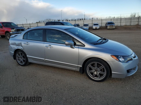 2010 Acura CSX Technology z VIN 2HHFD5F77AH201887, wystawiony jako Copart lot #77610604 z przebiegiem 94 442 mil mil oraz Szkoda całkowita • Salvage title. Historia ofert i sprzedaży dostępna na DreamBid. Obrazek 4.