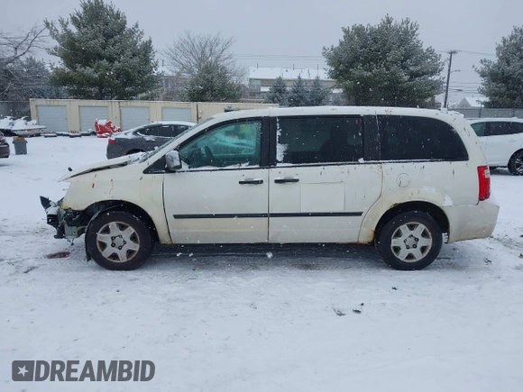 2009 Dodge Grand Caravan with VIN 2D8HN11E19R703857, listed as a IAAI auction lot 41195565 with 199,776 mi miles and . Bid and sale history available at DreamBid. Image 15.