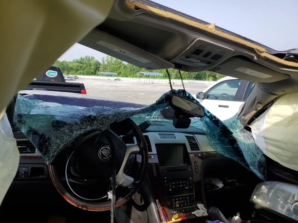 2007 Cadillac Escalade z VIN 1GYFK63837R153531, wystawiony jako Copart lot #56426285 z przebiegiem Nie podano mil oraz Szkoda całkowita • Salvage title. Historia ofert i sprzedaży dostępna na DreamBid. Obrazek 8.