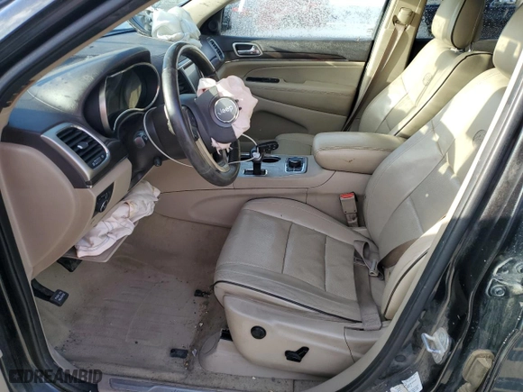 2014 Jeep Grand Cherokee Overland with VIN 1C4RJFCM5EC417335, listed as a Copart auction lot 87300714 with 0 mi miles and Salvage Title. Bid and sale history available at carsss.com. Image 7.