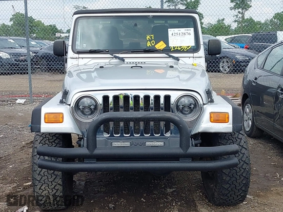2004 Jeep Wrangler Sport with VIN 1J4FA49S44P772575, listed as a IAAI auction lot 42512876 with 226,387 mi miles and . Bid and sale history available at DreamBid. Image 13.