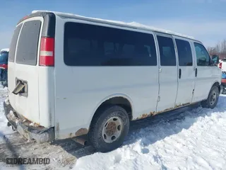 2012 Chevrolet Express Passenger 1LT with VIN 1GAZG1FG0C1150999, listed as a IAAI auction lot 41475070 with 334,911 mi miles. Bid and sale history available at carsss.com. Image 4.
