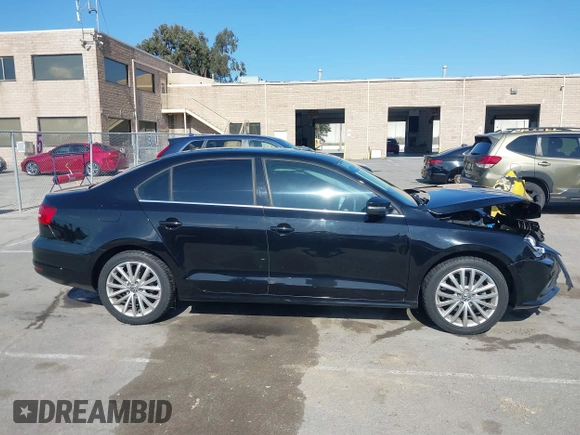 2015 Volkswagen Jetta Sedan 1.8T SE w/Connectivity with VIN 3VWD07AJ6FM354397, listed as a IAAI auction lot 41772983 with 100,265 mi miles. Bid and sale history available at carsss.com. Image 13.