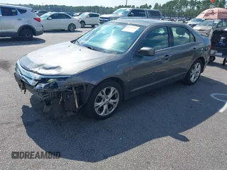 2012 Ford Fusion SE with VIN 3FAHP0HA0CR102548, listed as a IAAI auction lot 42628344 with 166,597 mi miles and . Bid and sale history available at DreamBid. Image 2.