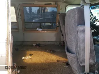 1990 Chevrolet Chevy Van z VIN 1GBEG25K0L7167885, wystawiony jako Copart lot #72575264 z przebiegiem 231 827 mil mil oraz Szkoda całkowita • Salvage title. Historia ofert i sprzedaży dostępna na DreamBid. Obrazek 11.