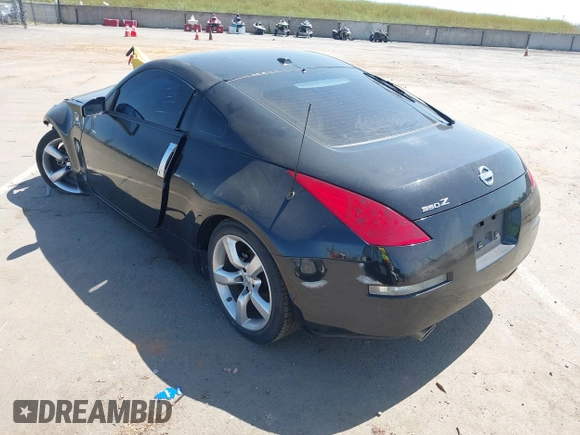 2008 Nissan 350Z Grand Touring with VIN JN1BZ34EX8M750793, listed as a IAAI auction lot 42093716 with 124,386 mi miles. Bid and sale history available at carsss.com. Image 3.
