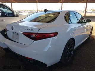 2018 Alfa Romeo Giulia Ti with VIN ZARFAECN3J7597798, listed as a IAAI auction lot 41675244 with 86,306 mi miles. Bid and sale history available at carsss.com. Image 4.