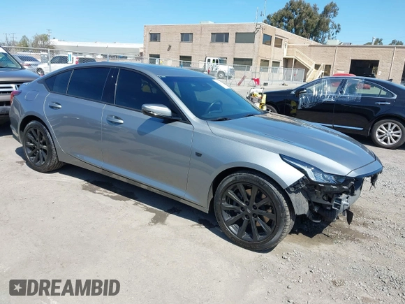 2023 Cadillac CT5 Luxury z VIN 1G6DW5RK7P0146345, wystawiony jako IAAI lot #41862152 z przebiegiem 18 902 mil mil oraz . Historia ofert i sprzedaży dostępna na DreamBid. Obrazek 1.