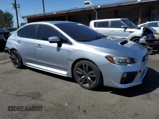 2016 Subaru WRX Limited with VIN JF1VA1J65G9818699, listed as a Copart auction lot 52116595 with 123,247 mi miles and Salvage title. Bid and sale history available at DreamBid. Image 4.