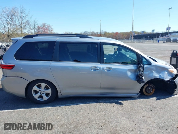 2015 Toyota Sienna LE AAS with VIN 5TDKK3DC0FS663826, listed as a IAAI auction lot 42050229 with 126,971 mi miles and . Bid and sale history available at DreamBid. Image 13.