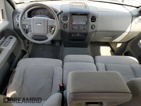2007 Ford F-150 XLT with VIN 1FTPX14597NA52942, listed as a Copart auction lot 52980215 with 149,889 mi miles and Salvage Title. Bid and sale history available at carsss.com. Image 8.