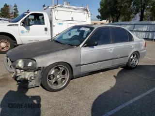 2000 Honda Civic VP with VIN 2HGEJ6612YH577711, listed as a Copart auction lot 52239805 with 195,138 mi miles and Salvage Title. Bid and sale history available at carsss.com. Image 1.