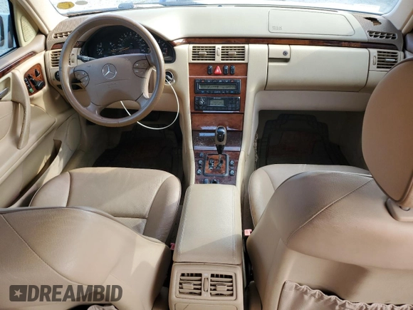 2002 Mercedes-Benz E-Class with VIN WDBJF65J12B434067, listed as a Copart auction lot 74250764 with 102,118 mi miles and Salvage Title. Bid and sale history available at carsss.com. Image 8.