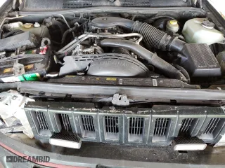 1995 Jeep Grand Cherokee Limited with VIN 1J4GZ78Y2SC723898, listed as a Copart auction lot 54142035 with 173,454 mi miles and Salvage Title. Bid and sale history available at carsss.com. Image 12.